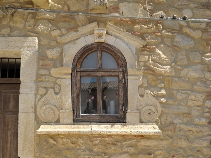 Image of details on the front wall of the historical residence in Gangi Sicily