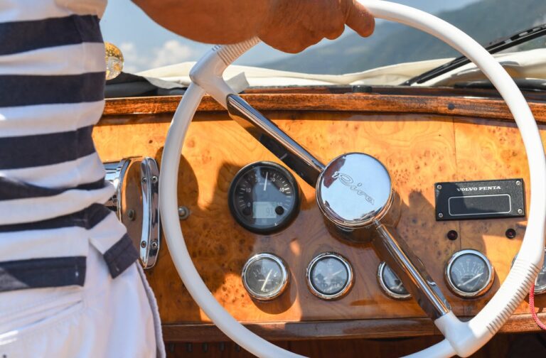 A man driving a Yacht Rental in Italy