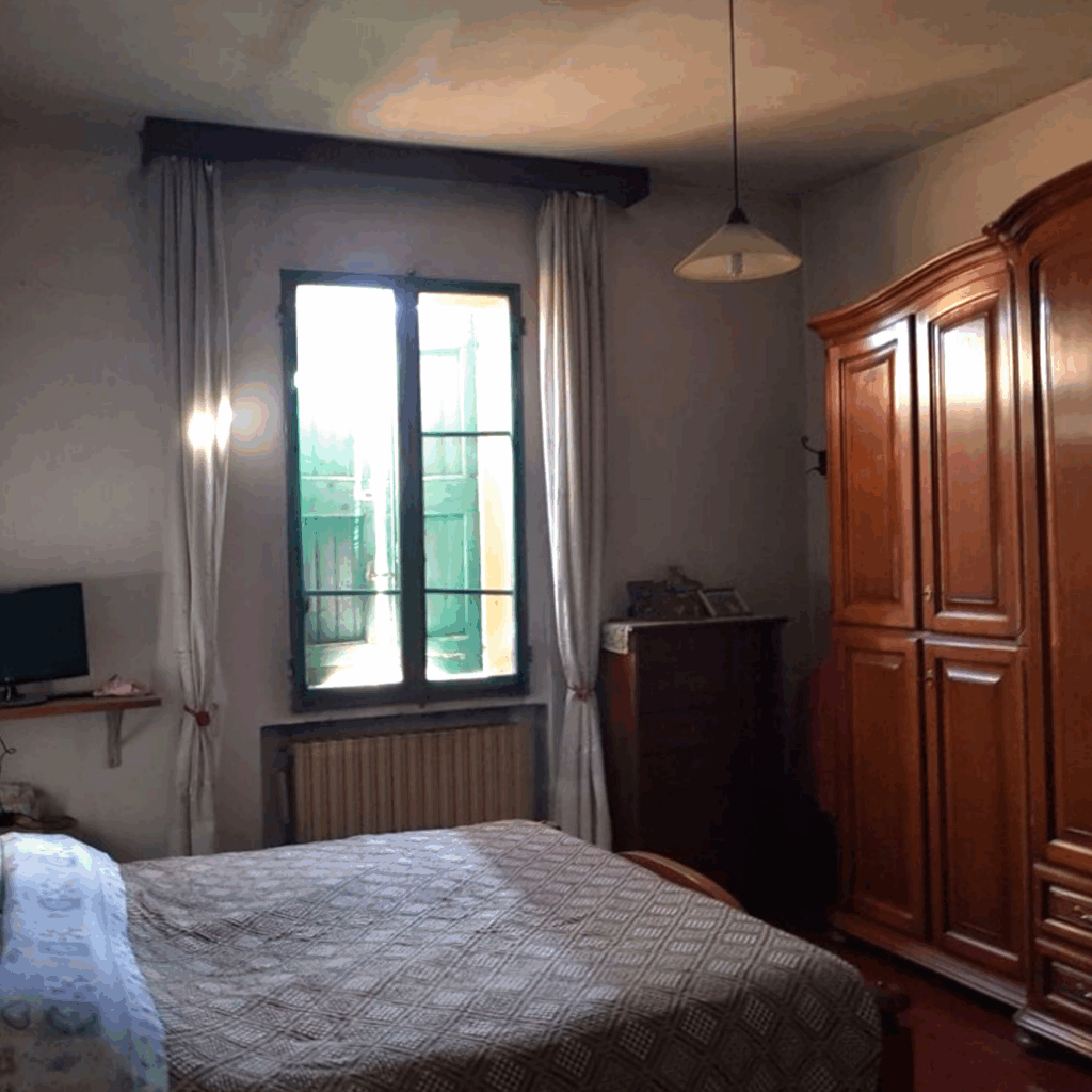 Image of the old villa and one bedroom before restoration