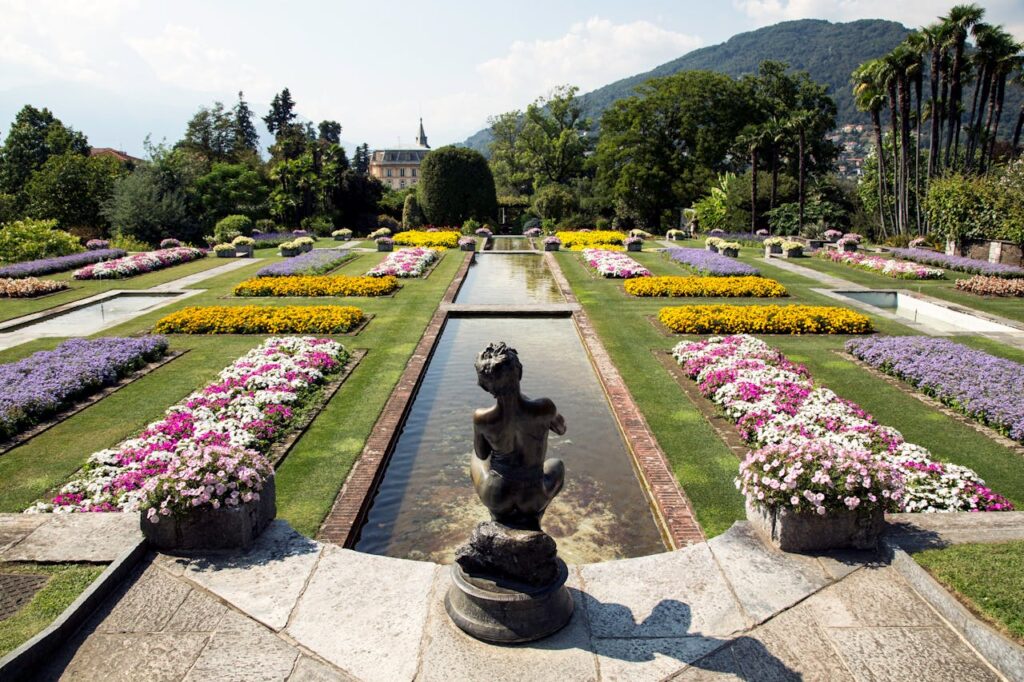 Italian villa with a pool and statue